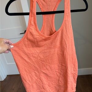 Lululemon Swiftly Orange tank top size 10 EUC